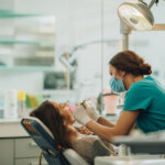 Patient getting treated at a dental office